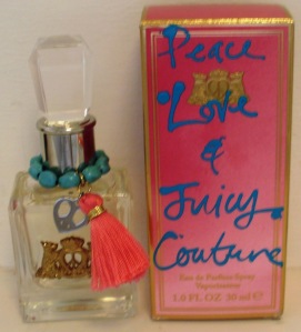 Juicy Couture Peace Love and Juicy Couture perfume sprayed 2 times still have box. $30