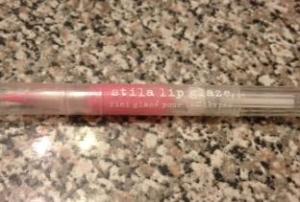 Stila Lipglaze in Melon. Used a handful of times but product is at about 90 percent. To me a little product goes a long way. Asking price is $5
