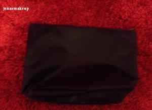 Free makeup bag. Navy blue. Free with purchase. Just ask. 